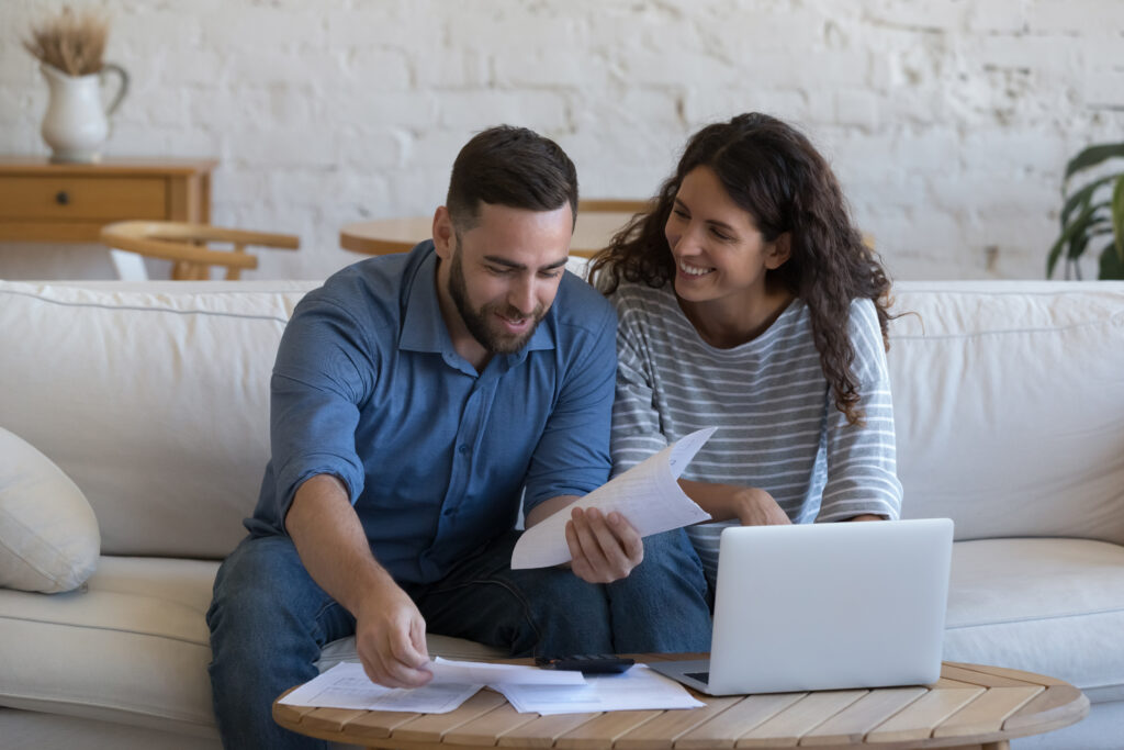 Homeowner's looking over their documents after speaking with a specialist from Solar Cancellation Resource Center Texas.